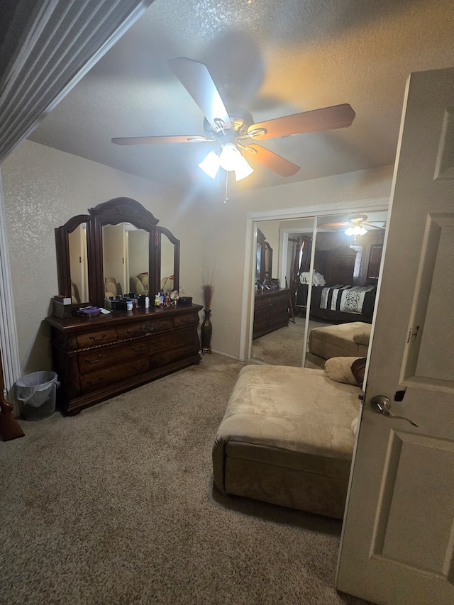 2301 Stoner Rd, Odessa, TX 79764 - bedroom with carpet flooring, ceiling fan, and a closet