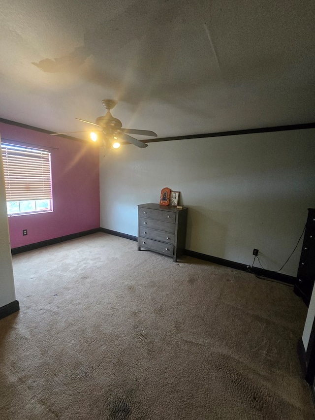 2301 Stoner Rd, Odessa, TX 79764 - unfurnished room featuring a ceiling fan and carpet flooring