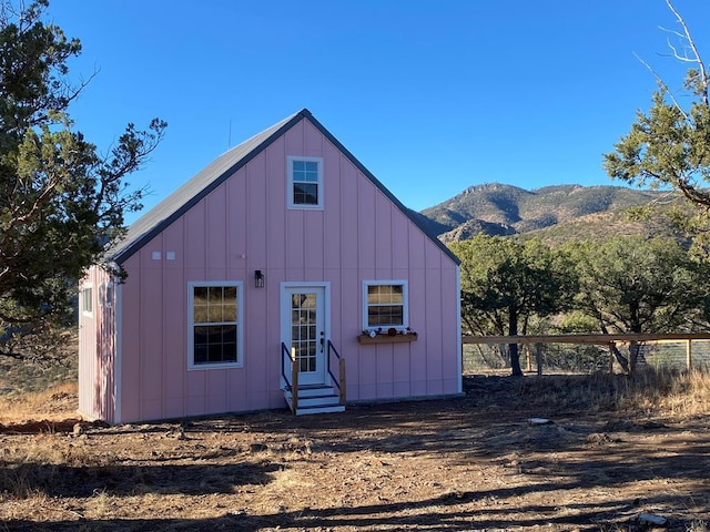102 Low Meadow Pt, Fort Davis, TX 79734 - view of front of house featuring entry steps, board and batten siding, and a mountain view