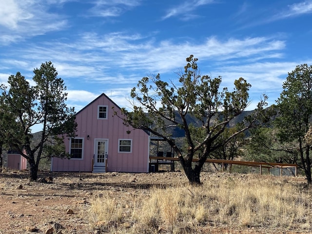 102 Low Meadow Pt, Fort Davis, TX 79734 - view of front of house featuring board and batten siding and an outdoor structure