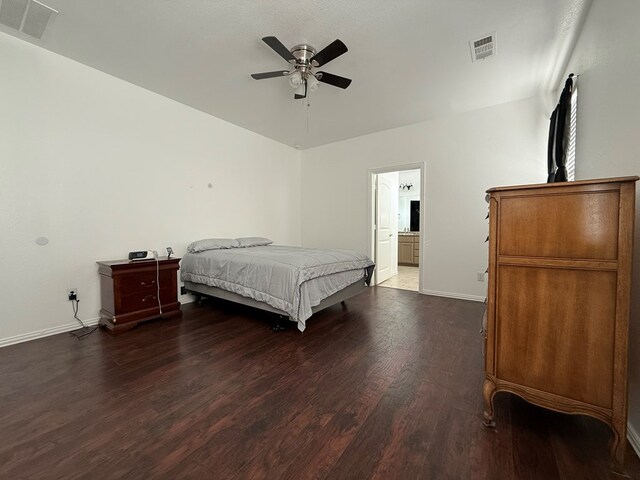 bedroom featuring baseboards, visible vents, ceiling fan, and dark wood-type flooring