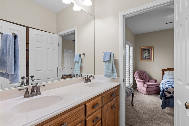 4975 SE 3000, Andrews, TX 79714 - bathroom featuring double vanity and ensuite bath