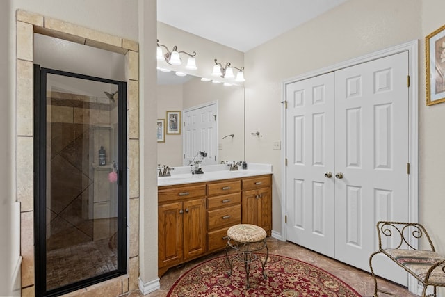 4975 SE 3000, Andrews, TX 79714 - bathroom featuring double vanity and a stall shower