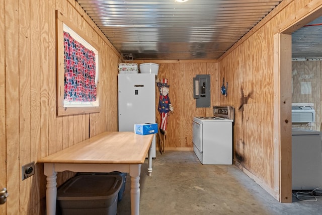 4975 SE 3000, Andrews, TX 79714 - washroom featuring electric panel and wooden walls