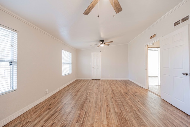 empty room featuring light wood-type flooring, ceiling fan, and ornamental molding