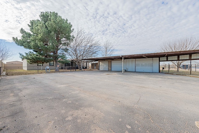 garage with a carport