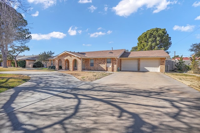 single story home featuring a garage