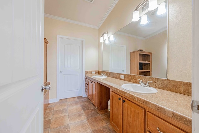 bathroom featuring vanity and crown molding