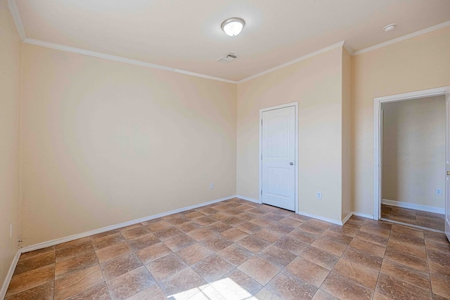 unfurnished bedroom featuring crown molding and a closet