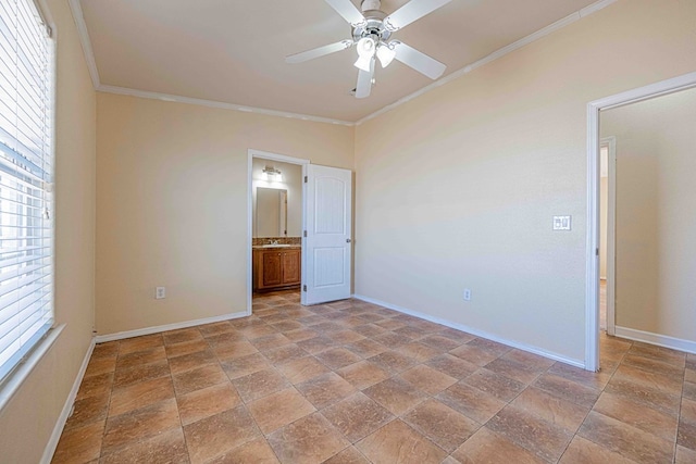 unfurnished bedroom featuring ceiling fan, crown molding, and ensuite bath