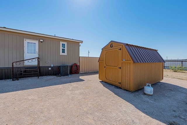 view of outbuilding with central air condition unit