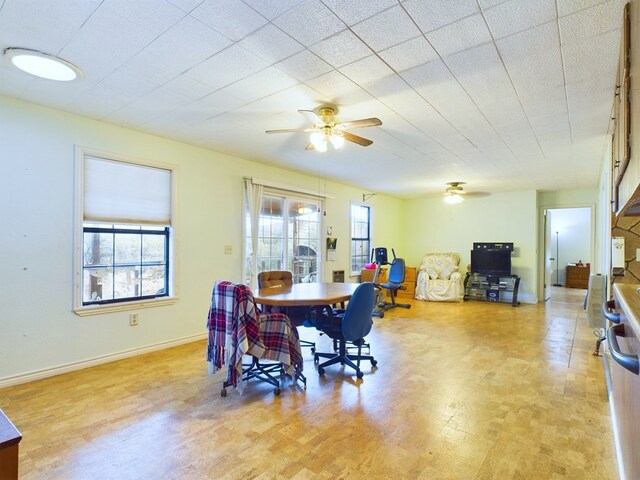 dining area featuring ceiling fan and light hardwood / wood-style floors