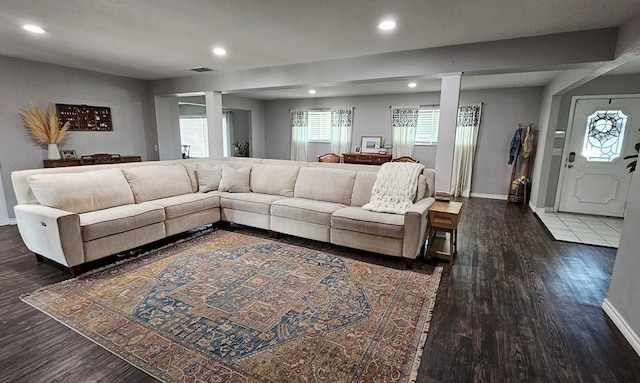 living room featuring dark hardwood / wood-style floors