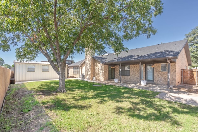 exterior space featuring a front lawn