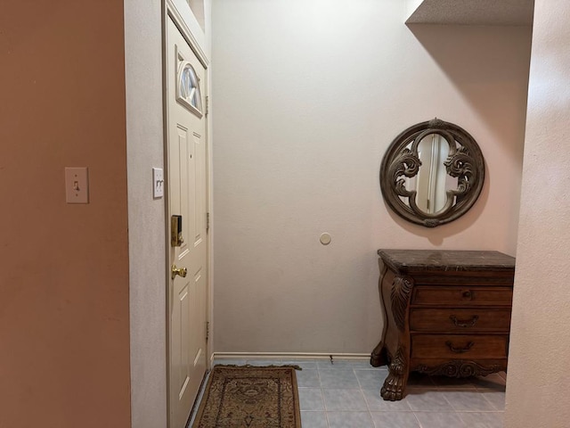 entryway featuring light tile patterned flooring