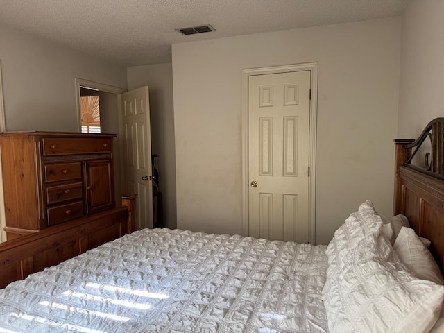 bedroom with a textured ceiling