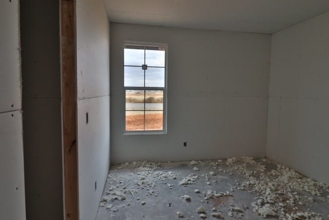 spare room featuring plenty of natural light