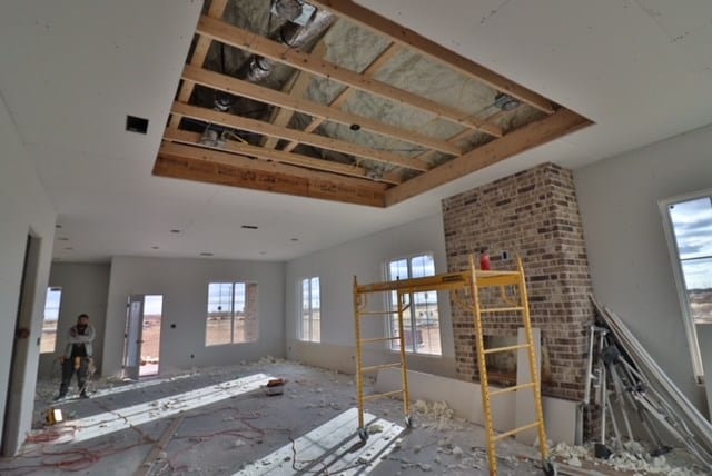 interior space with a tray ceiling