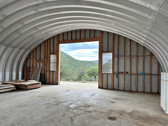 garage featuring a mountain view