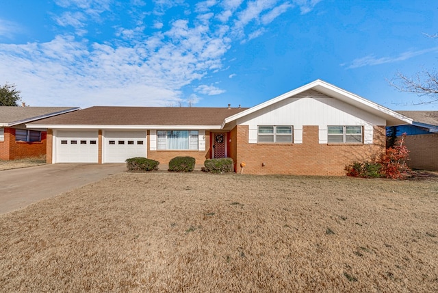 ranch-style house featuring a garage and a front lawn