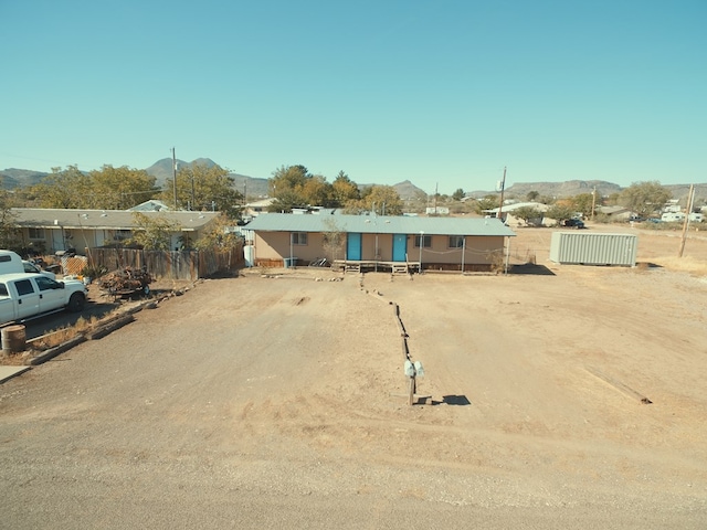 view of front of home featuring a mountain view