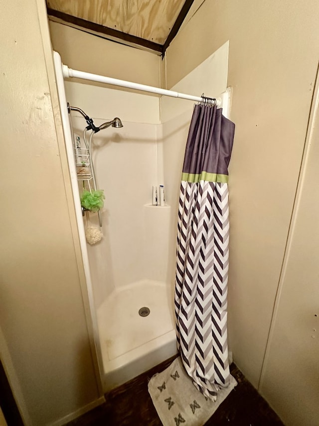 bathroom featuring walk in shower