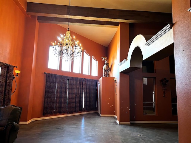 interior space featuring beamed ceiling, high vaulted ceiling, and a notable chandelier