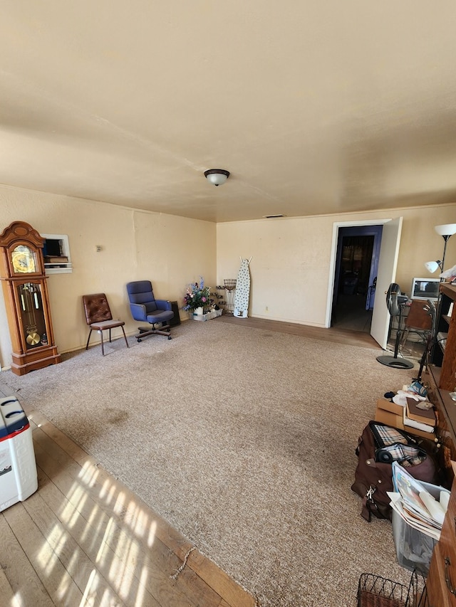 sitting room featuring carpet