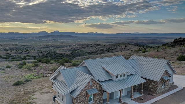 aerial view at dusk with a mountain view