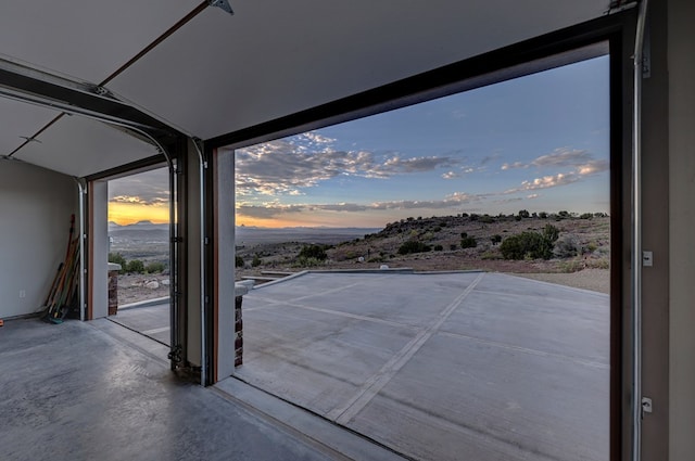 view of patio terrace at dusk