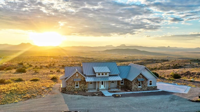 view of front of house with a mountain view and covered porch