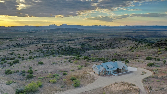 aerial view at dusk with a mountain view