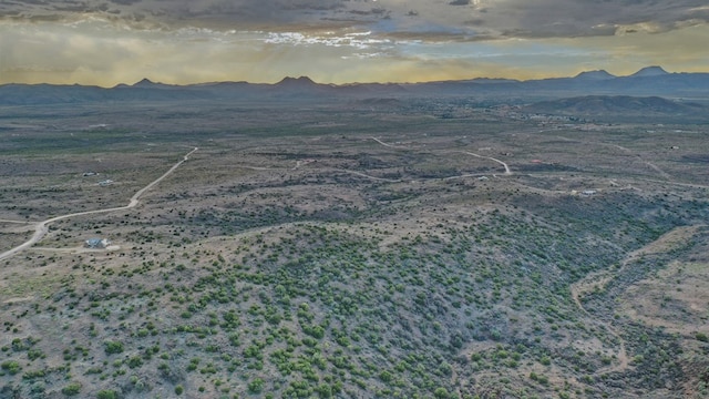 aerial view at dusk with a mountain view