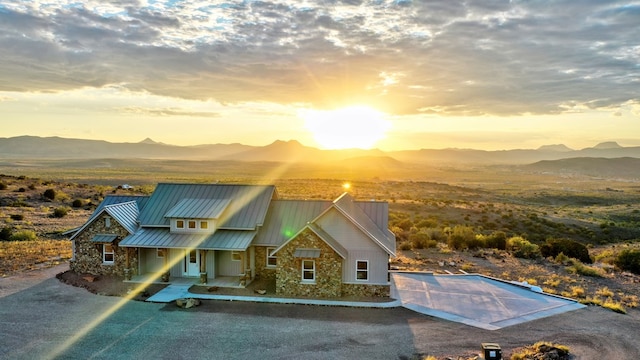 view of front of home featuring a mountain view and a porch