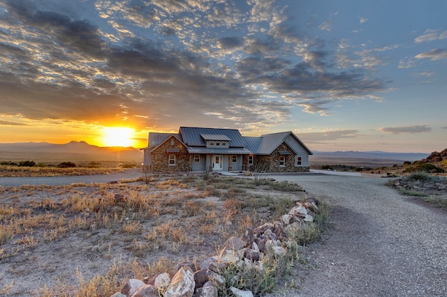 view of front of home featuring a mountain view and covered porch