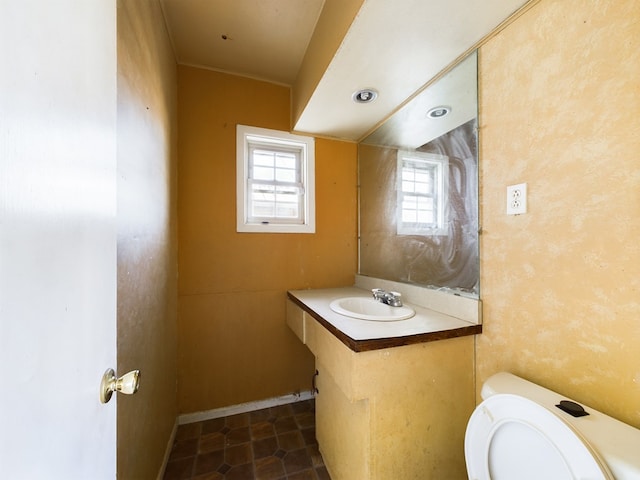 bathroom with vanity and toilet