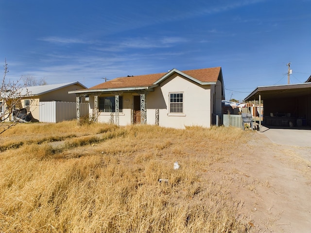 view of front of house featuring a carport