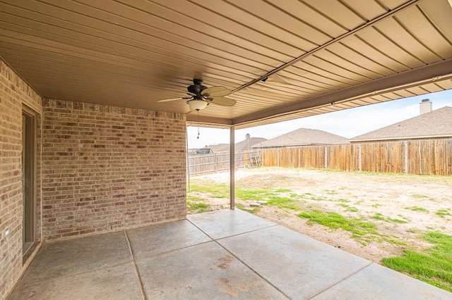 view of patio featuring ceiling fan