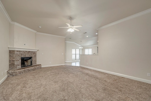 unfurnished living room featuring a brick fireplace, crown molding, baseboards, and carpet flooring