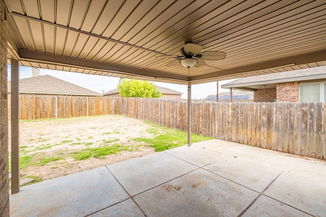 view of patio / terrace with a fenced backyard and a ceiling fan