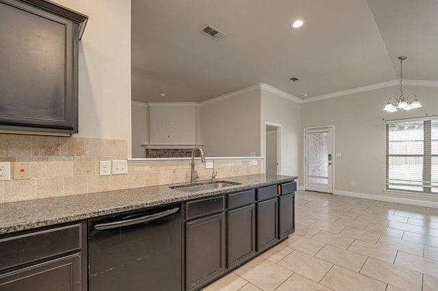 kitchen featuring a sink, visible vents, backsplash, dishwasher, and crown molding