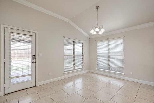 unfurnished room featuring an inviting chandelier, light tile patterned floors, vaulted ceiling, and crown molding