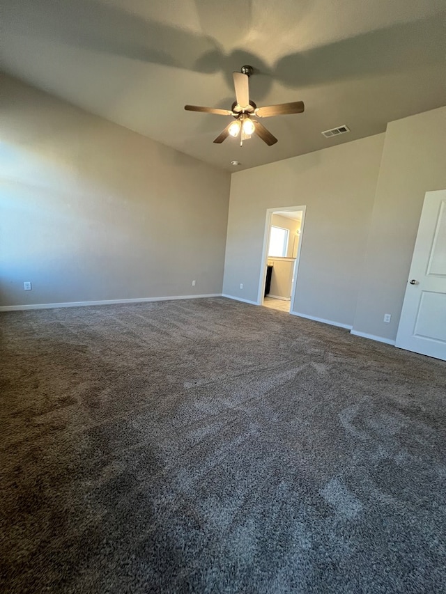 empty room with carpet and ceiling fan