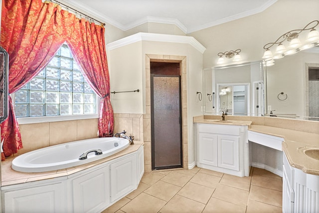 bathroom featuring tile patterned floors, vanity, ornamental molding, and independent shower and bath