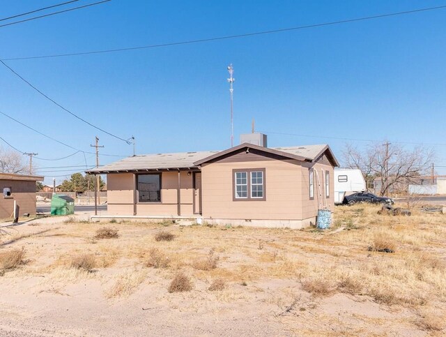 rear view of property with a patio