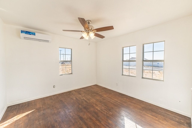 unfurnished room featuring ceiling fan, a healthy amount of sunlight, dark hardwood / wood-style floors, and a wall mounted AC