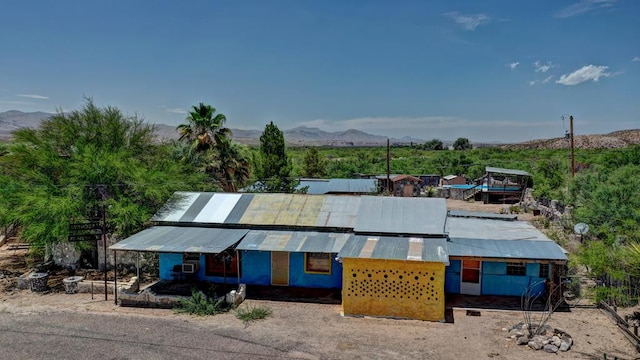 exterior space featuring a mountain view