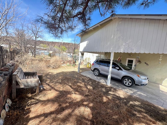 view of parking with a carport