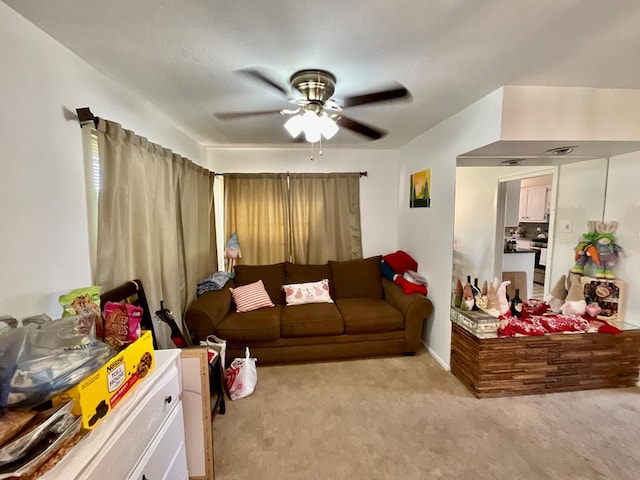 living room with light carpet and ceiling fan