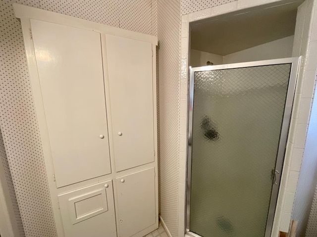 bathroom with an enclosed shower